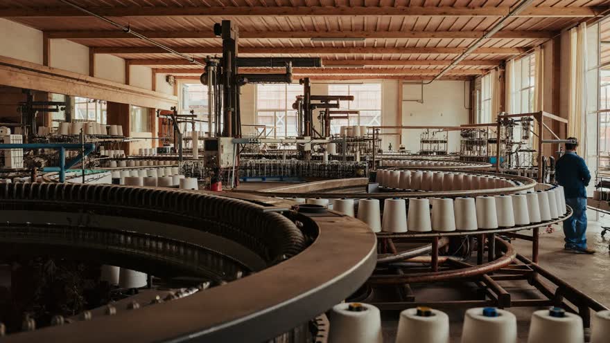 Knitting machines running in a mill
