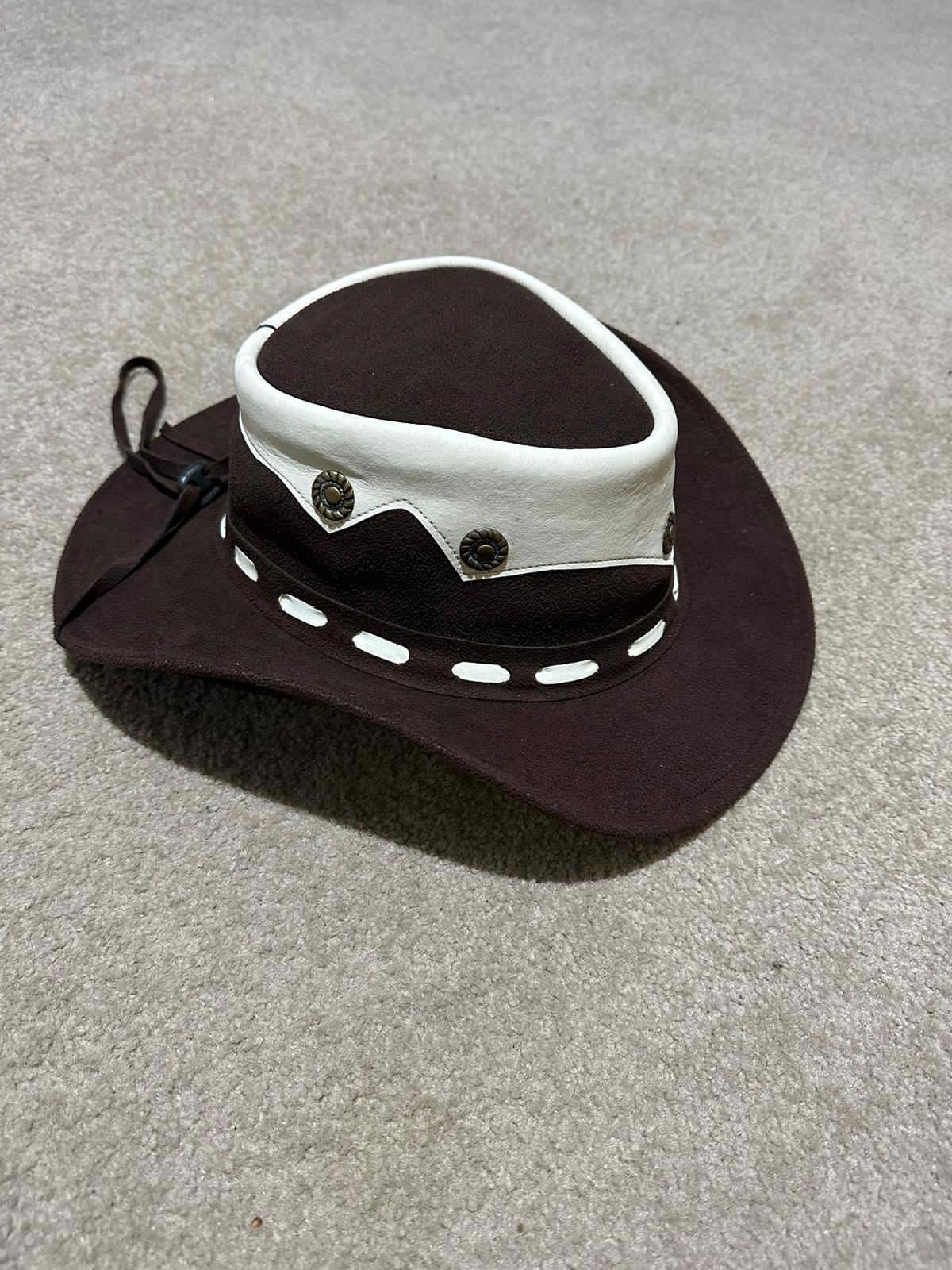 High Quality Cow Boy Hat Beautifully Adorn With Laces And Brass Conchos.