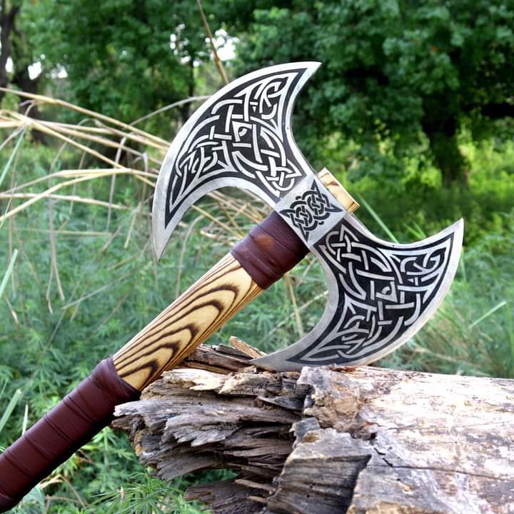  Beautifully Crafted Double-Bladed Axe With Intricate Designs On both The Blades And The Handle