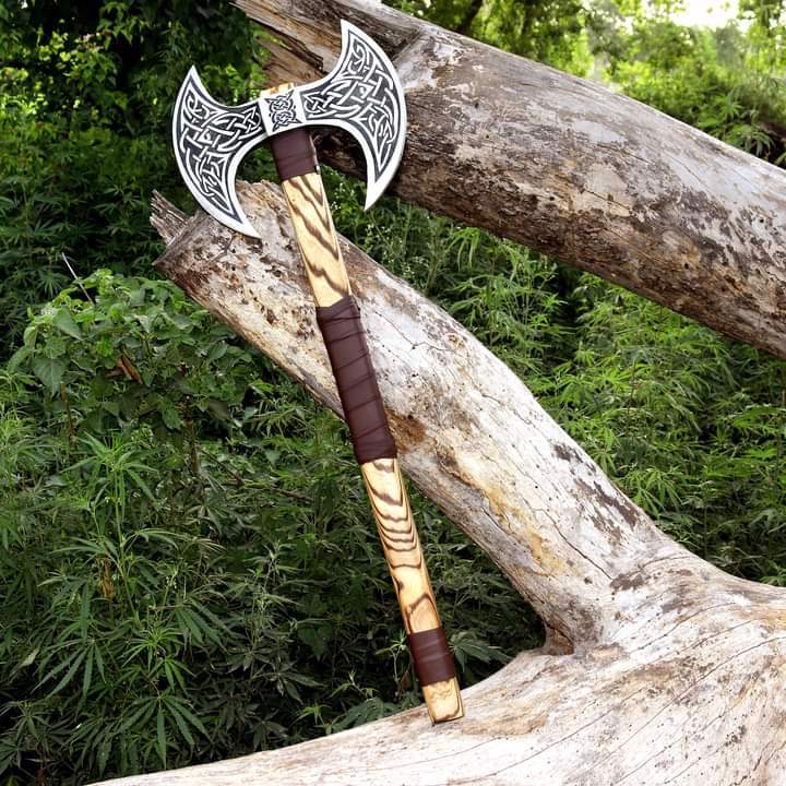  Beautifully Crafted Double-Bladed Axe With Intricate Designs On both The Blades And The Handle - view 2