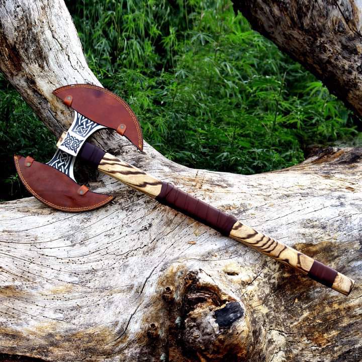  Beautifully Crafted Double-Bladed Axe With Intricate Designs On both The Blades And The Handle - view 3